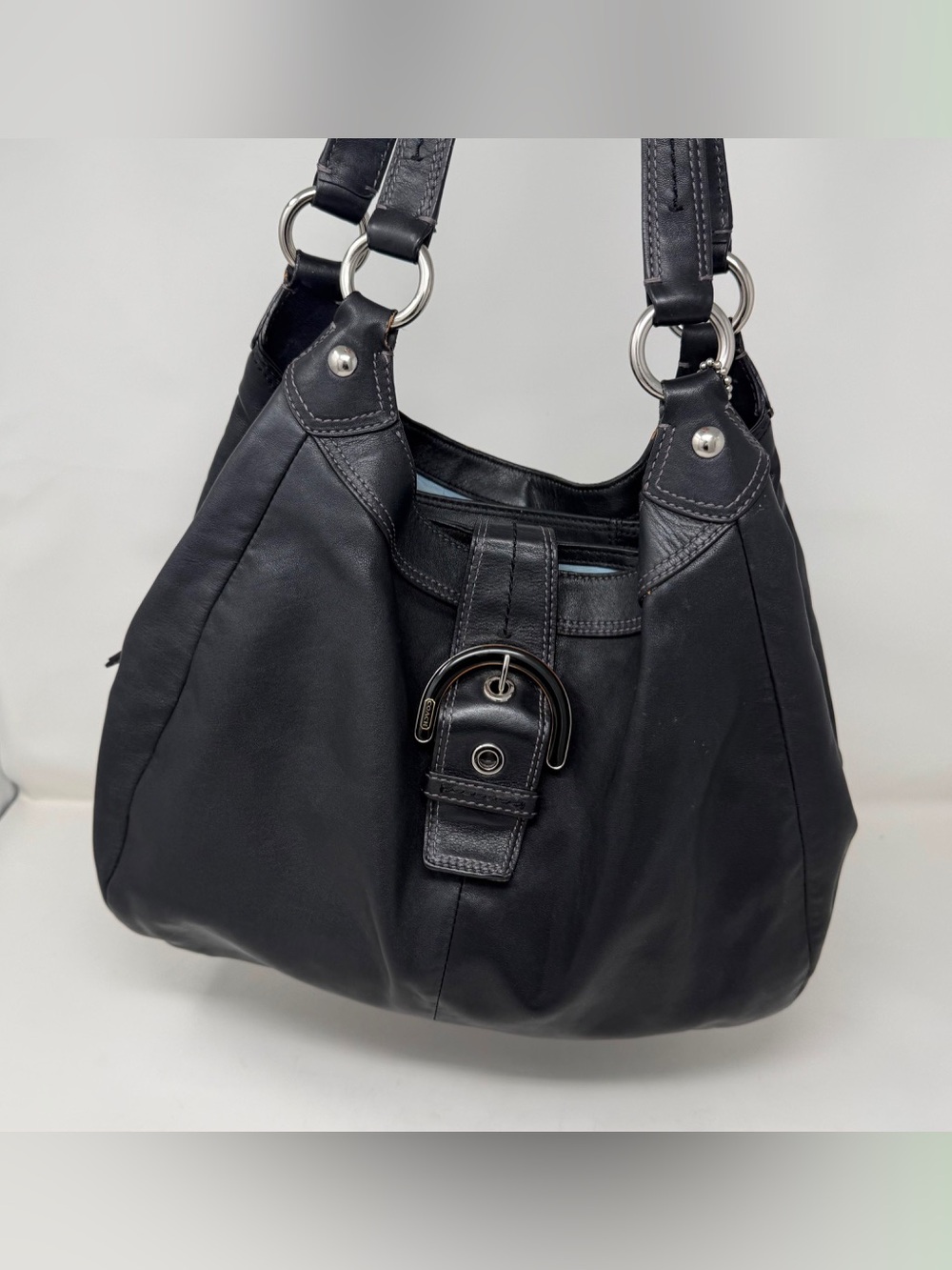 Coach black leather hobo bag with silver hardware.